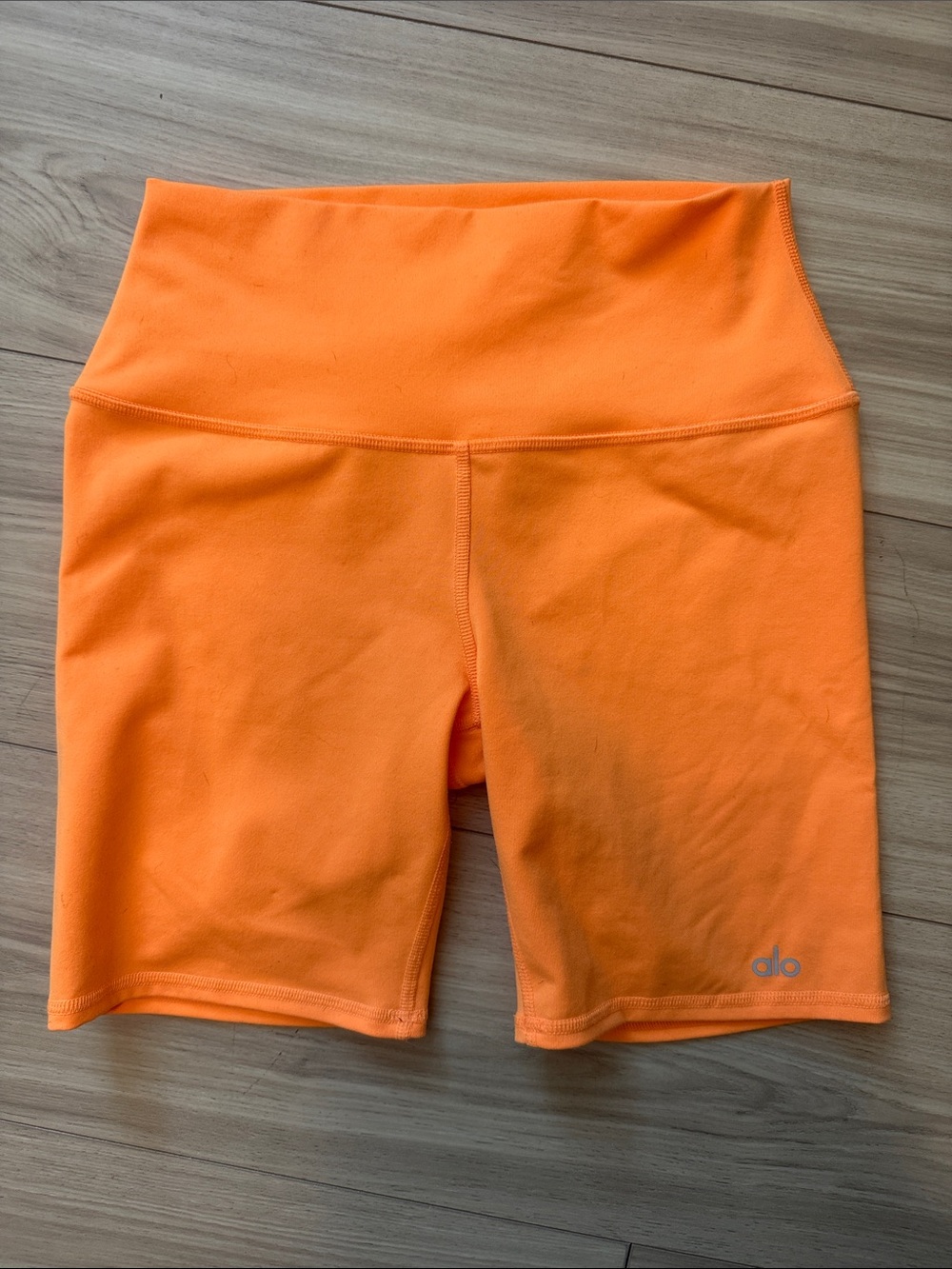 ALO Yoga High-Waist Bike Shorts in Vibrant Orange